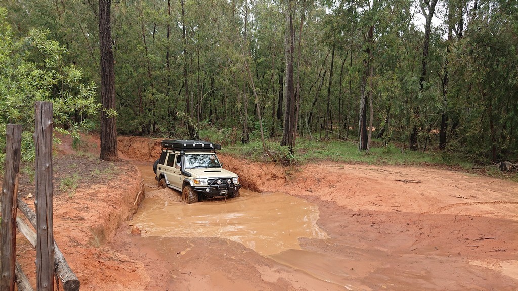 vehicle going through mud